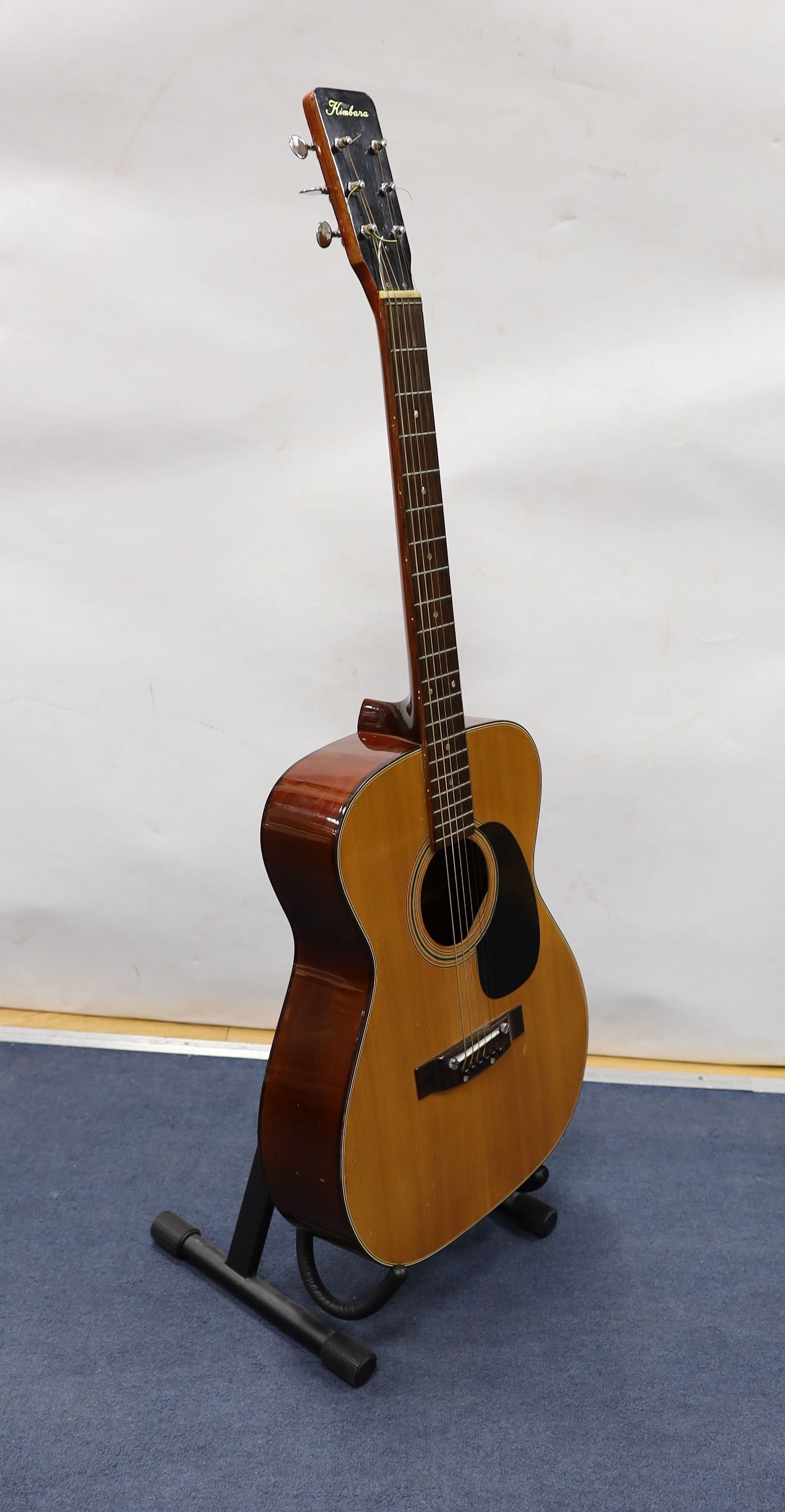 A Kimbala acoustic guitar.